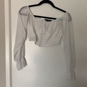 Prettylittlething white long-sleeve crop top